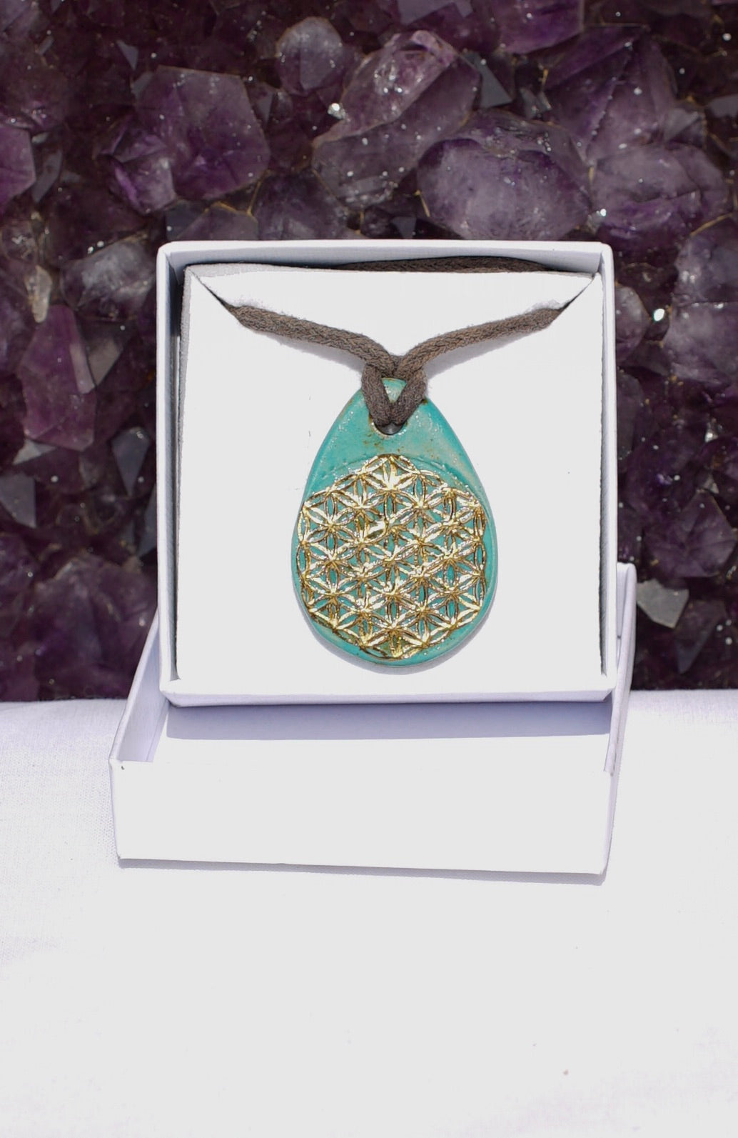 Amulet jade seed of life and flower of life in 24 carat gold