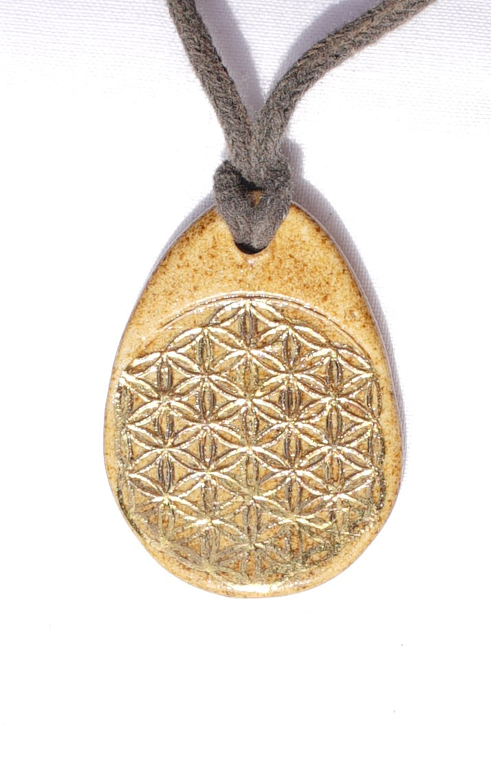 Amulet tree of life and flower of life in 24-carat gold