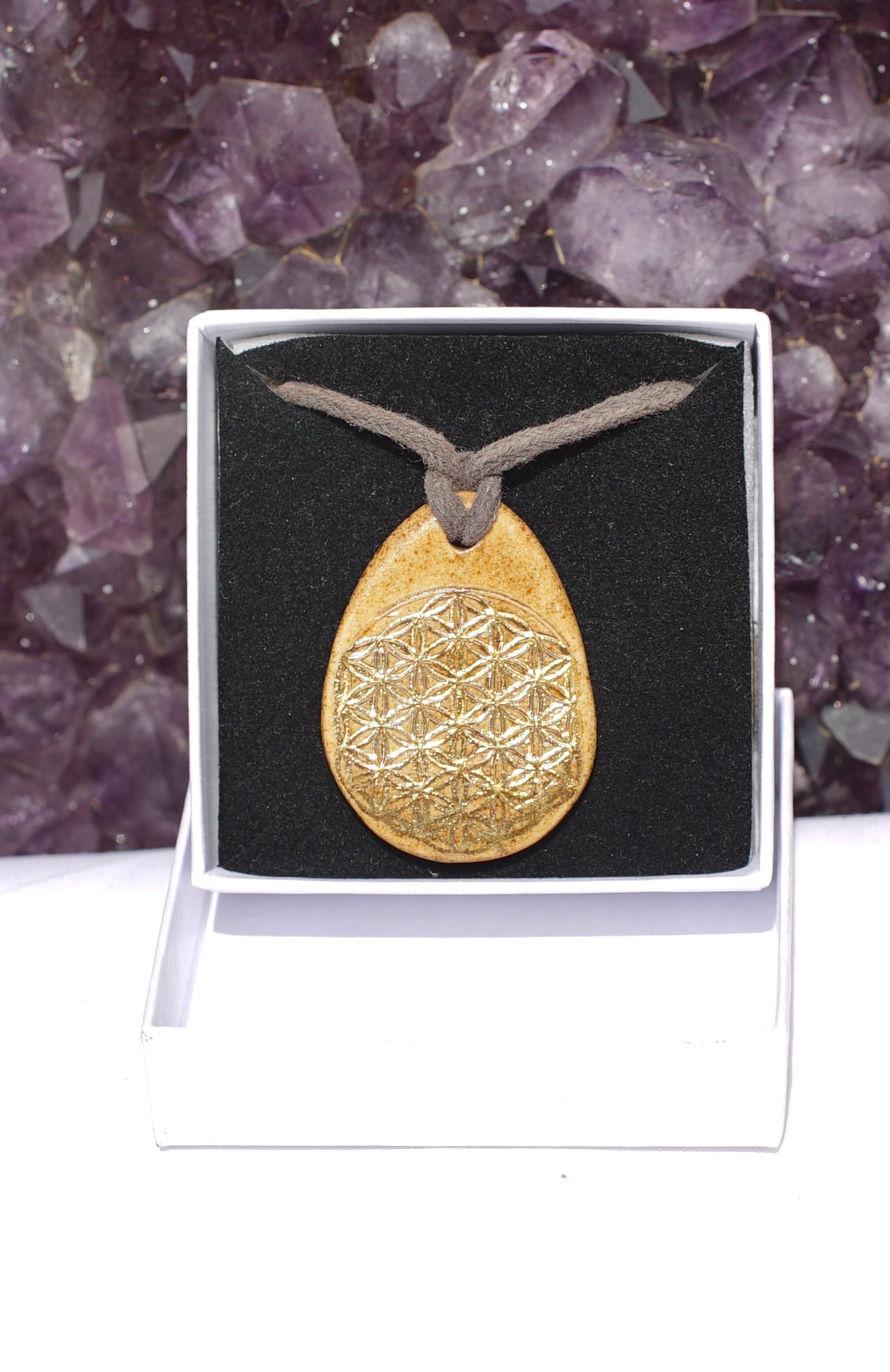 Amulet tree of life and flower of life in 24-carat gold