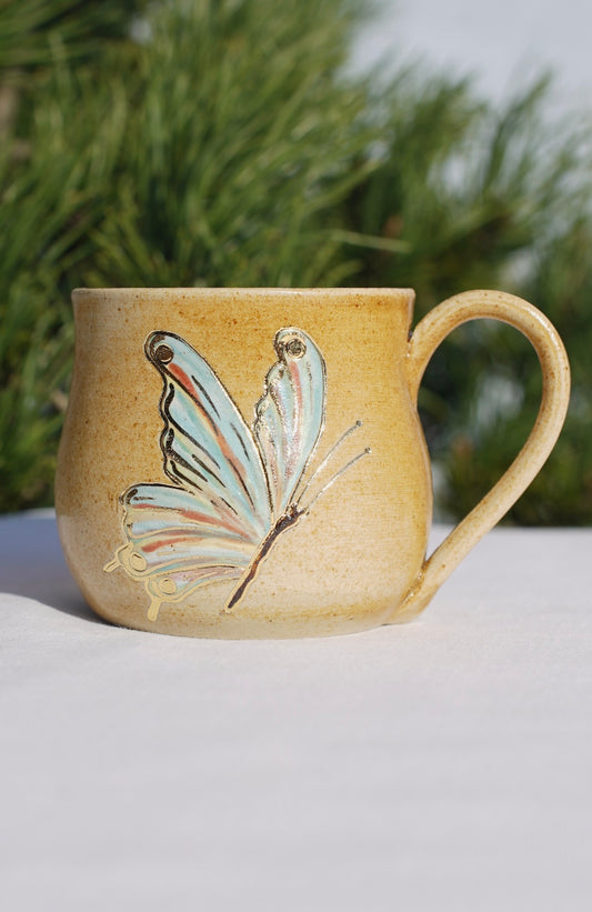 kleine Tasse Schmetterling