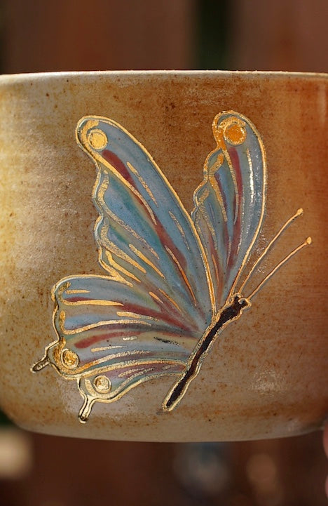 kleine Tasse Schmetterling