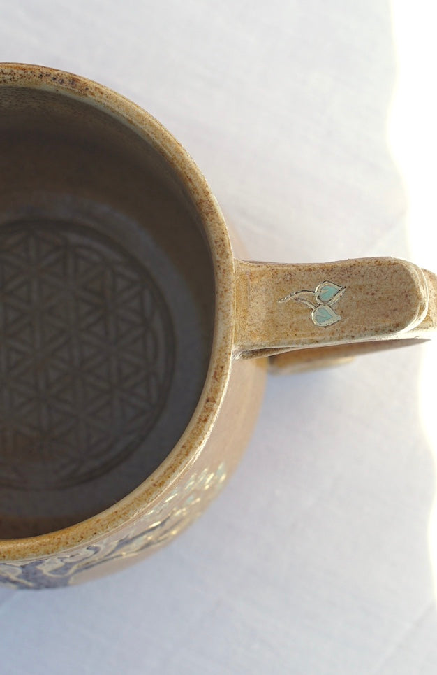 Antique tree of life cup with healing earth and gold