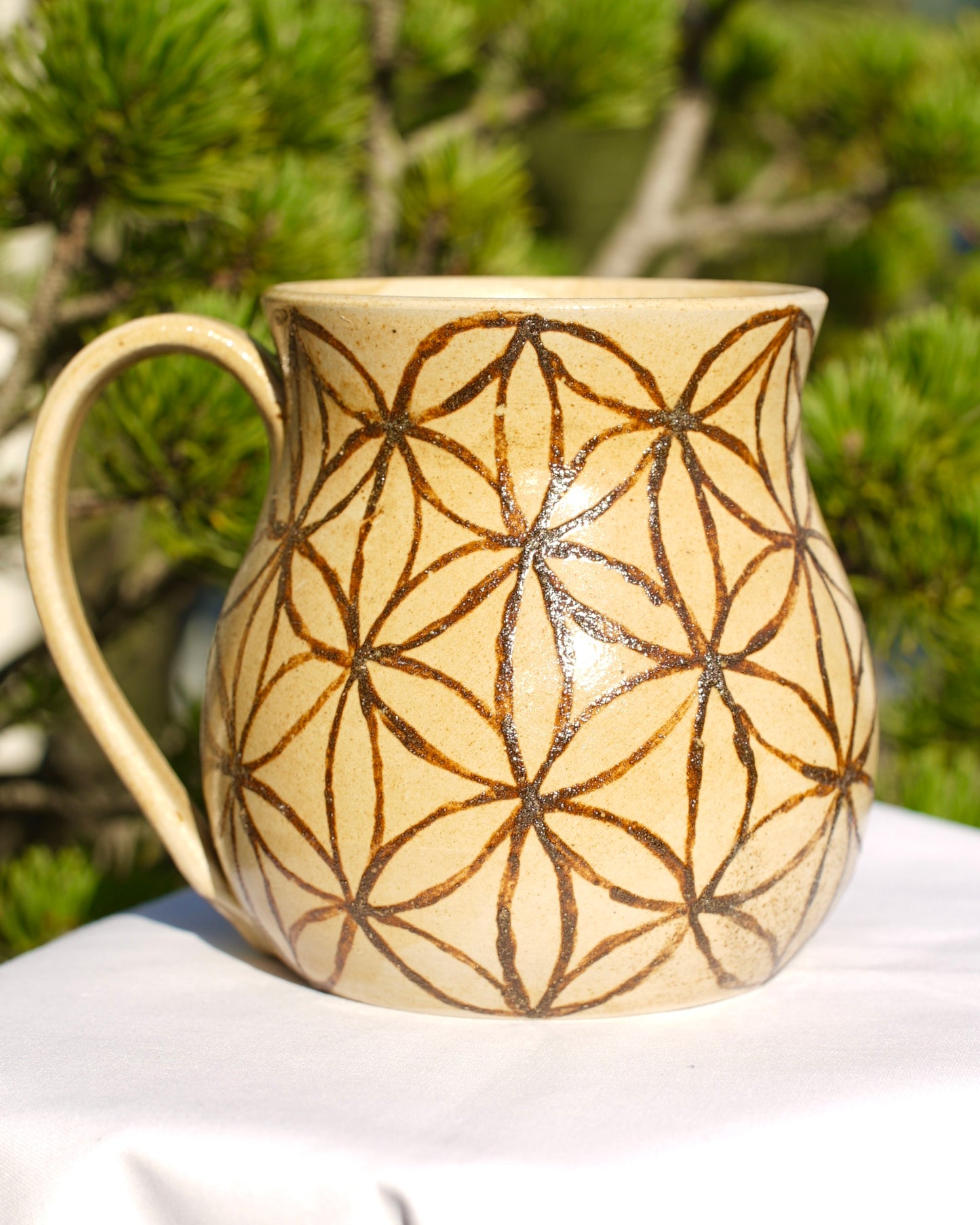 Flower of life cup made from healing clay
