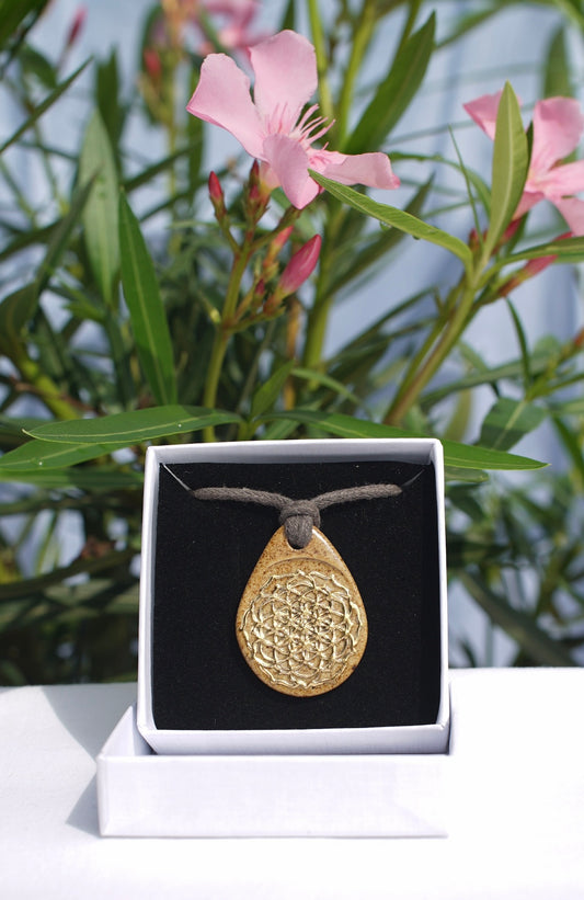 Amulett mit Blüte des Lebens in 24 Karat Gold