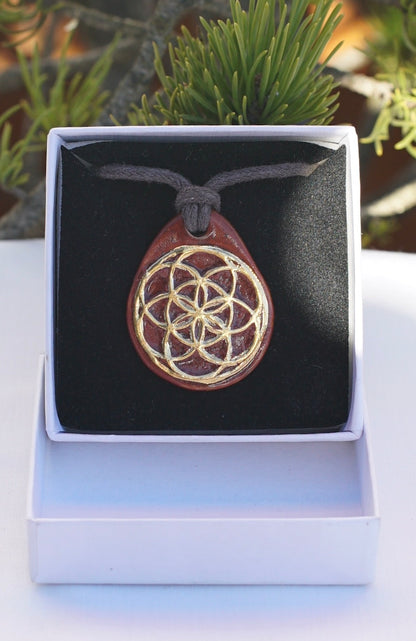 Amulett zimt Samen des Lebens und Blume des Lebens in 24 Karat Gold