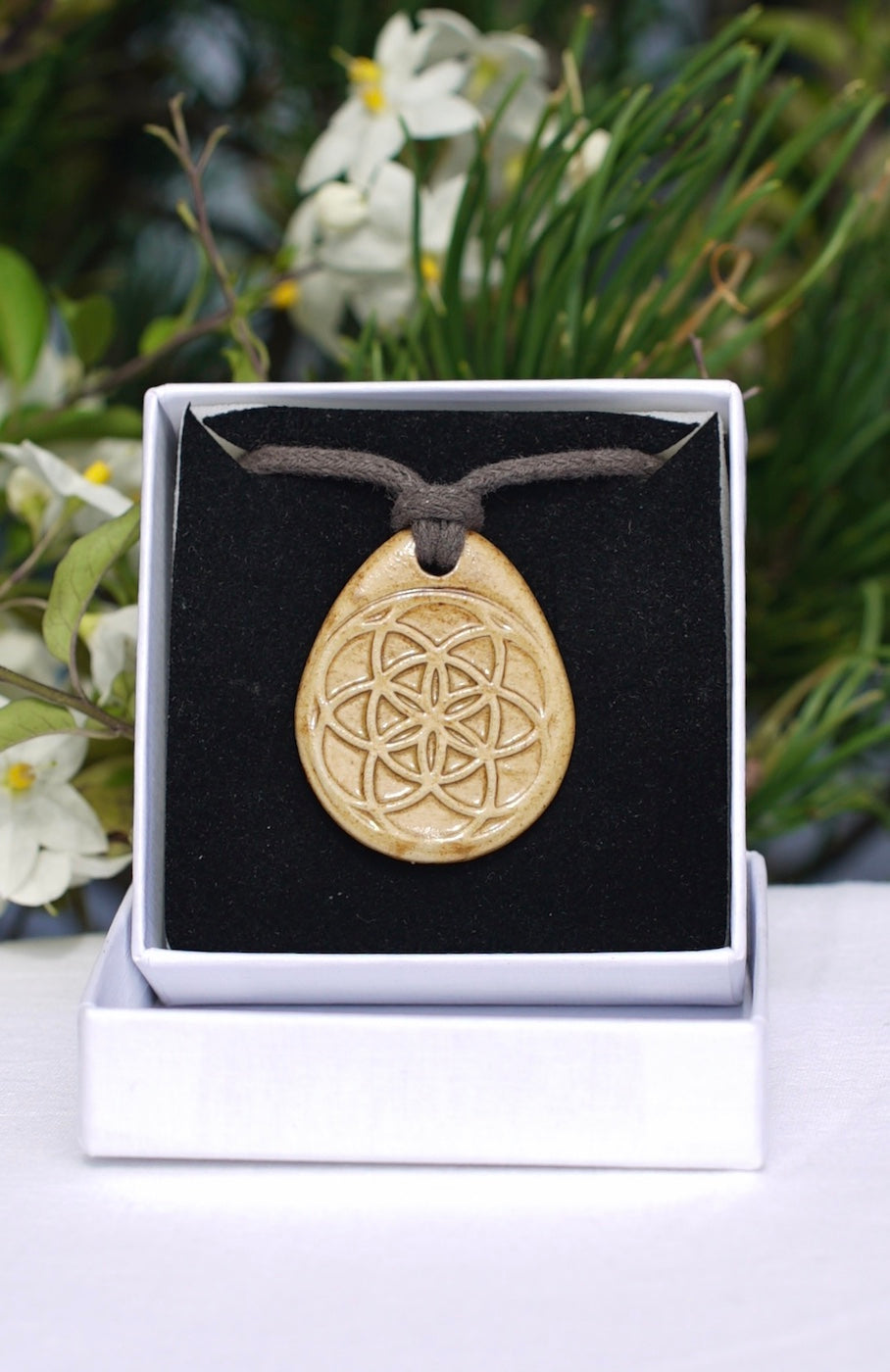 Amulette Graine de vie claire