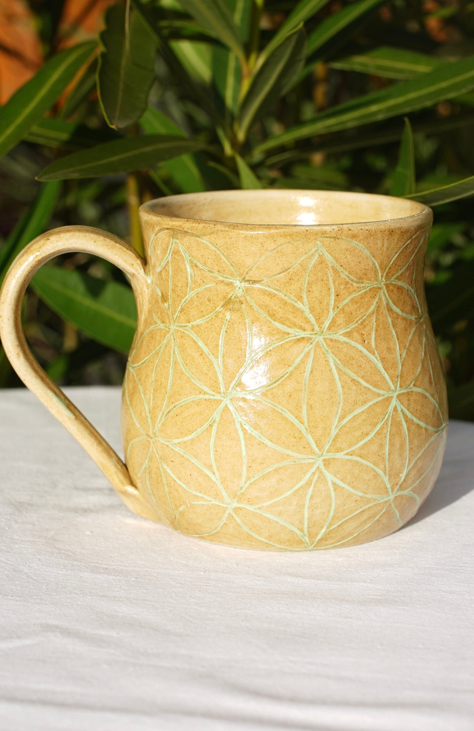 Flower of life mug light green sgraffito