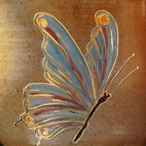 kleine Tasse Schmetterling