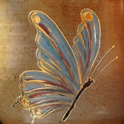 kleine Tasse Schmetterling