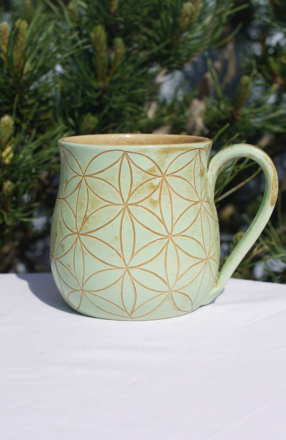 Flower of life mug light green sgraffito