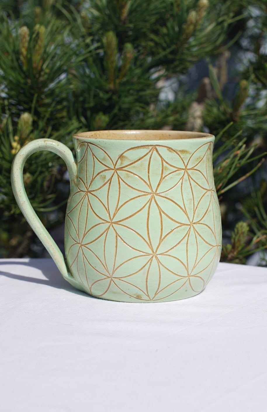 Flower of life mug light green sgraffito