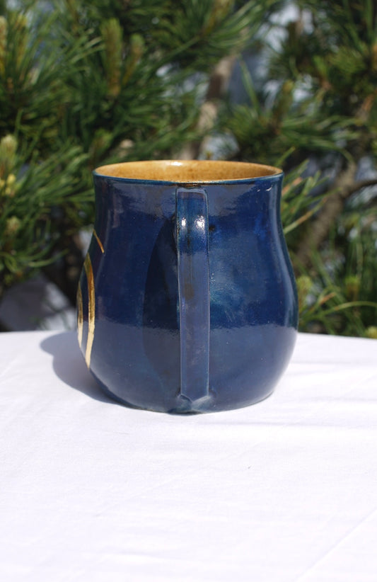 Tasse blau Spirale 24 Karat Gold