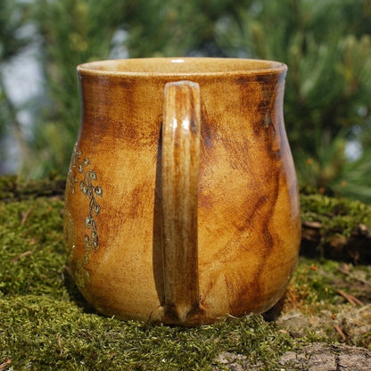 Tasse Triskele in 24 Karat Gold und Runen