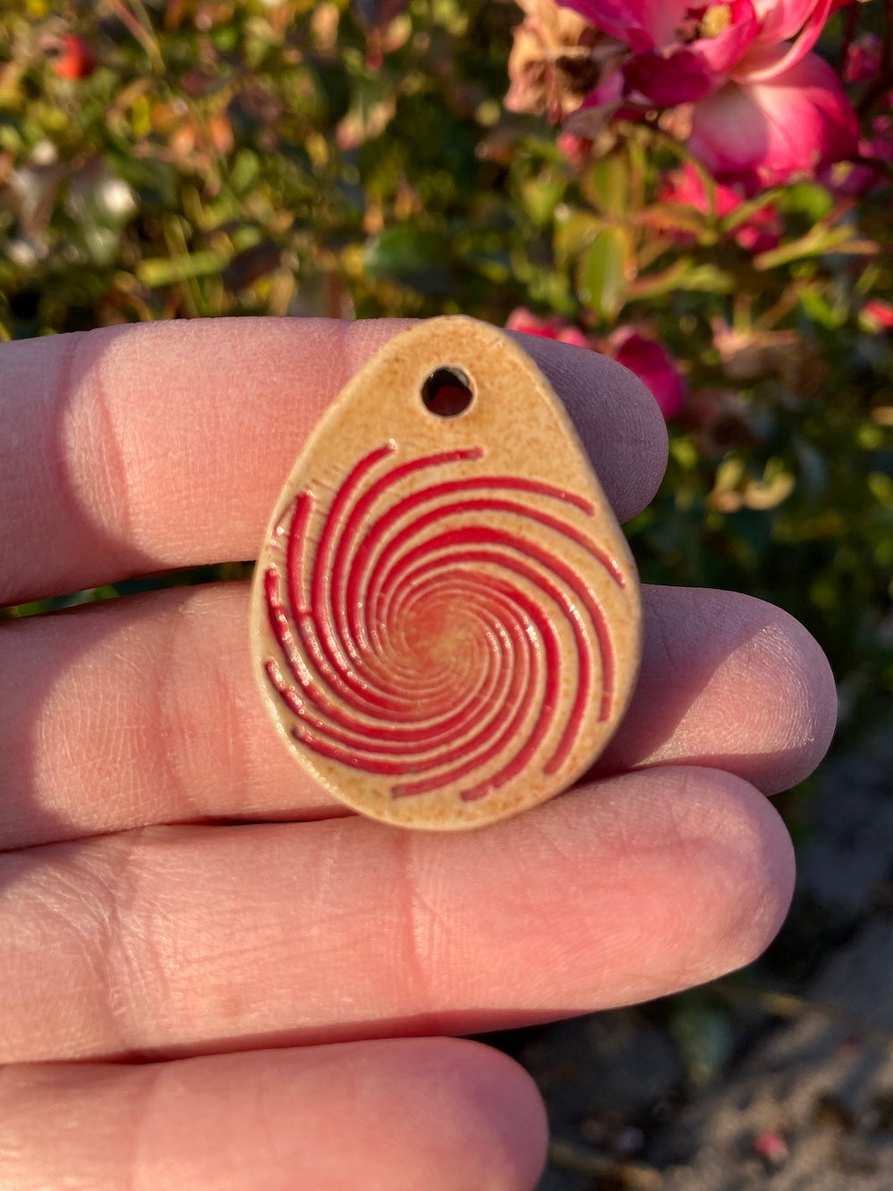 Amulet spiral red with Agnihotra ash