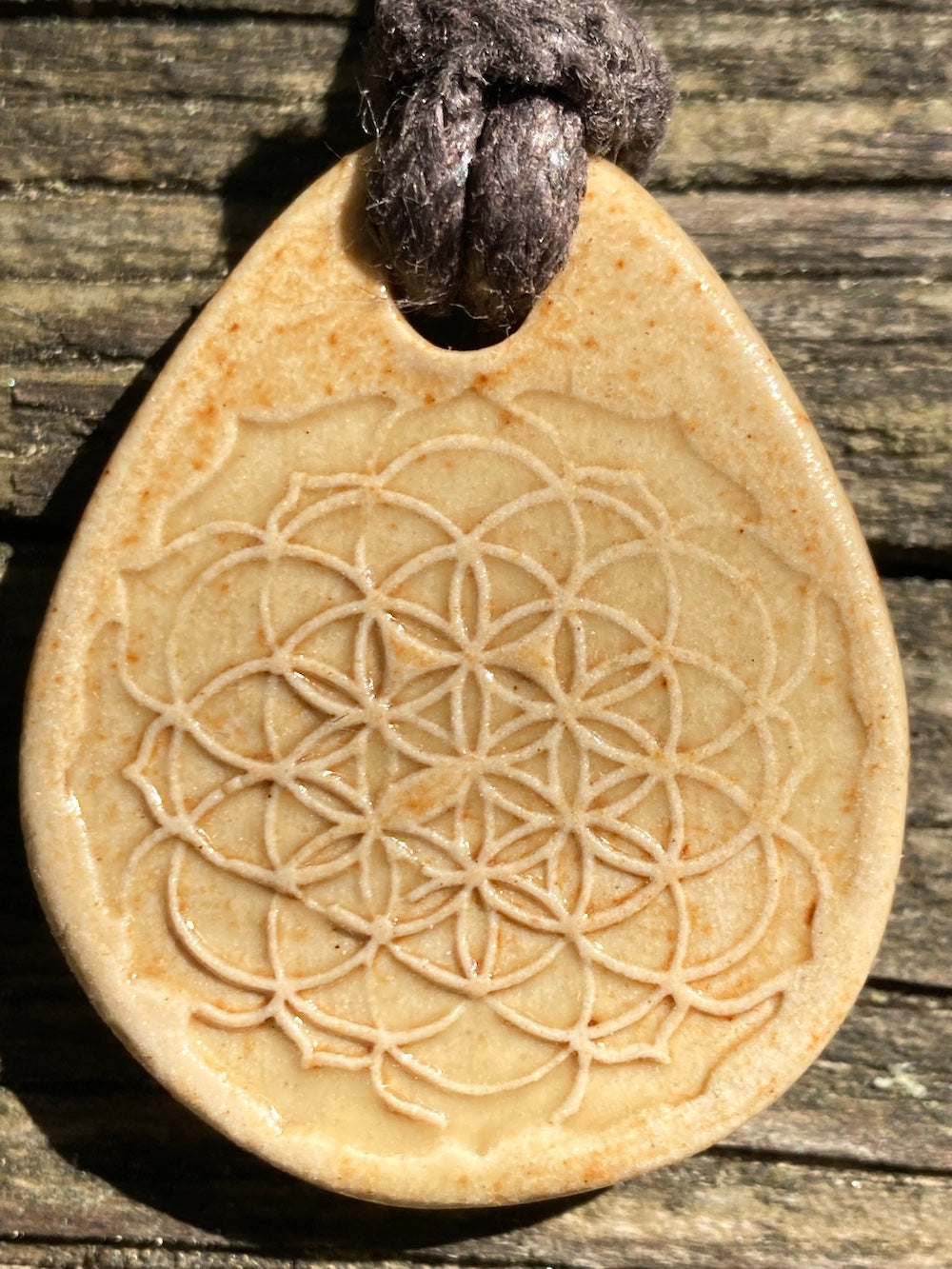 Amulet with flower of life